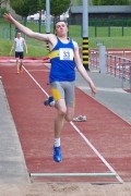 Paul Record lauches towards the long jump pit